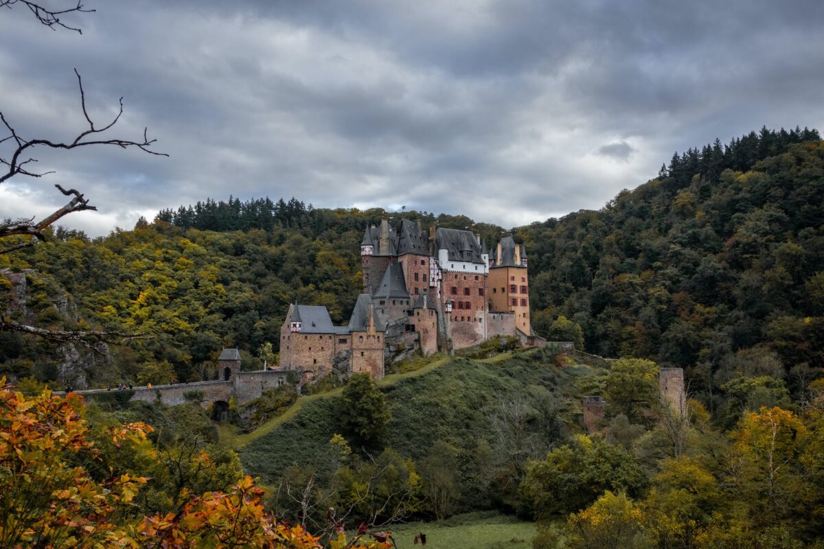 medieval eltz castle on a hill in autumn forest wierschem germany
